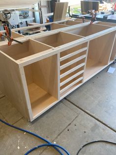 the unfinished cabinets are ready to be built into the floor in the shop or workshop