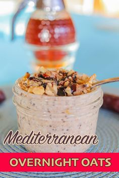 a jar filled with overnight oatmeal sitting on top of a blue plate