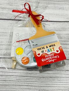 a craft kit for valentine's day on a wooden table