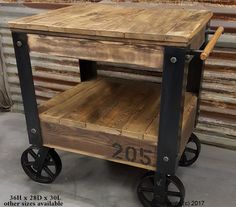 a small wooden cart with wheels on it