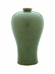 a green vase is shown against a white background