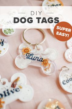 some dog tags are on a table with the words, diy dog tags super easy