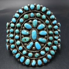 "OLD NAVAJO BRACELET DESCRIPTION: This exquisite cuff features round and oval cabs of old natural turquoise set in micro serrated bezel. This fabulous vintage bracelet will be a cherished addition to your collection of fine vintage Native American jewelry. MEASUREMENTS: Interior of the cuff measures 5\" with an additional 1\" slightly adjustable gap. Total circumference: 6\" Measures 2 1/8\" straight across the widest part (from wrist bone to wrist bone) Bracelet face measures 2 1/2\" wide (the Bone Bracelet, Morenci Turquoise, Bones Bracelet, Vintage Native American Jewelry, Navajo Bracelet, Vintage Bracelet, Coral Turquoise, American Jewelry, Natural Turquoise