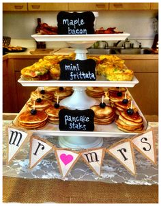 an image of a cake with donuts on it