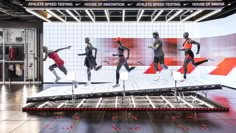 a group of mannequins are running on a stage