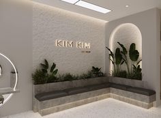 the entrance to kim's new restaurant in miami, florist with succulents and cacti