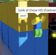 an animated image of a man standing in front of a giant box that says look at these hd shadows yeah