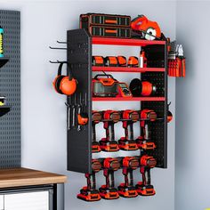 there is a garage storage rack with tools on it