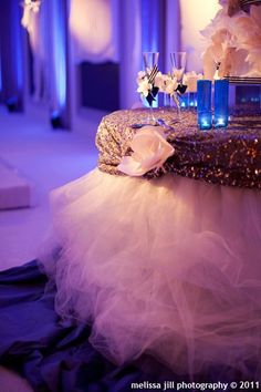 the table is decorated with blue and white flowers