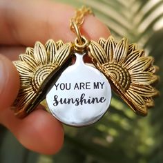 Beautiful Yellow Faux Gold Necklace Sunflower Necklace Inclosed Within The Sunflower Is A Secret Charm With “You Are My Sunshine” Written On It Daughter/Niece/Cousin/Friend "I'm Just Thinking Of You" Gift Symbol Jewelry, Sunshine Necklace, Symbol Of Strength, Gold Link Necklace, Formal Jewelry, Rhinestone Statement Necklace, Sunflower Necklace, Crystal Choker Necklace, Red Pendants