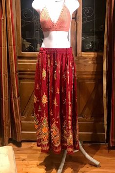 Sequined Embroidery Maroon Gold painted Long Maxi Skirt, Bohemian Boho Chic Festival Ethnic Hippie Summer Sparkle One Size Feminine Long Skirt. Crochet or tie dye top is not included. You will feel so good in this gorgeous skirt. Beautiful Long Maxi skirt hand embroidery, hand sequined gold painted and it sparkles so each skirt is unique and one of a kind. This rayon Maroon skirt is made using soft light and beautiful rayon fabric. Rayon was the first manufactured fiber. The term rayon was offic Maroon Skirt, Hippie Summer, Skirt Crochet, Long Maxi Skirt, Festival Pants, Boho Chic Dress, Embroidery Hand, Ethnic Dress, Long Maxi Skirts