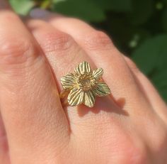 a sterling silver daffodil ring from me to you! <3 This piece is carefully hand carved out of wax and cast in sterling silver Silver Finish Oxidized to blacken the recesses and taken up to a high polish Gold vermeil option available upon request for an additional fee Care Instructions This piece is made from solid sterling silver, so it's very durable and made to last! If you want to give your ring a little TLC, I recommend a gentle scrub with dish soap and a soft toothbrush.  Made to Order/Processing Time Each piece of my jewelry is made to order in your perfect size and unique specifications. Due to the custom nature, rings have a processing time of 2-3 weeks. If your piece is a gift/you need it sooner, please contact me and I'll see what I can do! Quarter sizes for rings available upon Nature Rings, Silver Plant, Plant Jewelry, Jewelry Flower, Soft Toothbrush, Flower Ring, Ring Handmade, 14kt Gold, Daffodils