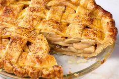 an apple pie is cut in half and ready to be eaten with the crust removed