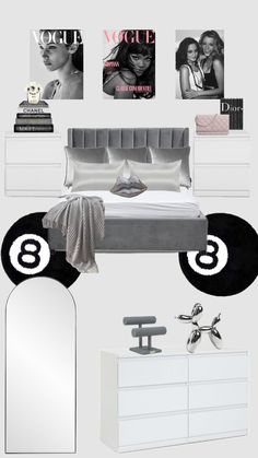 a bedroom with white furniture and pictures on the wall, including a bed, dresser, mirror