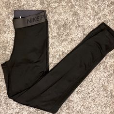 Nike Pro Leggings Dri Fit Size Xs Sit At The Waist 88% Polyester 12% Spandex Kinda Feels Like Fleece On The Insides Nwot Bought And Tried On, Doesn’t Fit Like I Hoped. My Loss Your Gain. Grey Nike Leggings, Nike Compression, Running Yoga Pants, Stirrup Leggings, Nike Pro Leggings, Boot Cut Leggings, Gym Pants, Nike Leggings, Compression Leggings