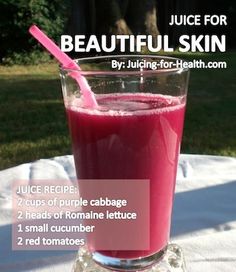 a pink smoothie in a glass on a table with information about the recipe and how to use it