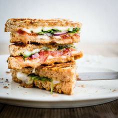 two grilled sandwiches stacked on top of each other with the words 10 yummy breakfast recipes to try out for weight gain