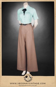 "Oh, boy! Tip your hat! These timeless Marlene trousers with their ingenious zipper opening hidden in the side pocket combine feminine and masculine elements just perfectly. The high waistband with a pointy fishtail detail and four belt loops make this easy to style and adjust. Several darts in the back provide for beautiful curves, the wide and slightly flared leg add just the right amount of coolness. High-quality linen blend makes the elegant trousers wonderfully easy to care for, ensures opt 1940 Trousers Women, 1930s British Fashion, Turn Of The Century Fashion, 1920s Womens Fashion Casual, Vintage Wide Leg Linen Bottoms, Fitted Vintage Linen Bottoms, Vintage High-waist Beige Pants, Vintage Brown Bottoms For Workwear, Vintage Brown Wide Leg Pants