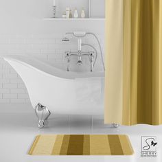 a bath tub sitting next to a shower curtain in a white bathroom with yellow stripes on the floor