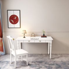 a white desk and chair in a room