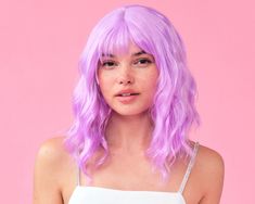 "✨Wiggin Out: we hope you're ready to have fun, because our purple pastel wig guarantees the absolute best night ever! ✨Wavy + Short: this wig hits just below the shoulder, measures 12-14\" long, features a curtain bang and is perfectly styled in the softest waves you and your Dyson were never able to achieve ;) ✨Pretty in Purple: this is the perfect muted, pastel purple wig - it will take any outfit to the next level. ✨Party Ready: whether you're celebrating your bff's bachelorette party, your Wig Bachelorette Party, Wig Bachelorette, Birthday Party Purple, Pastel Wig, Swoop Bangs, Rave Hair, Purple Wig, Purple Pastel, Pink Hair Bows