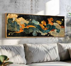 a painting hanging on the wall above a couch