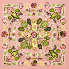 an art work with fruits and vegetables arranged in a circular pattern on a beige background