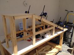 a workbench with tools on top of it in the process of being built