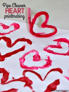 valentine's day art project for kids with pipe cleaner hearts