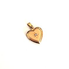 14k gold vintage heart locket with starburst diamond 12mm X 20 mm with jump ring Victorian Medallion Jewelry With Heart Charm, Vintage Charm Heart-shaped Yellow Gold Jewelry, Yellow Gold Heart Jewelry With Vintage Charm, Yellow Gold Heart Pendant Locket With Vintage Charm, Yellow Gold Heart Pendant Locket Necklace With Vintage Charm, Victorian Yellow Gold Heart Charm Locket Necklace, Victorian Yellow Gold Locket Necklace With Heart Charm, Vintage Charm Yellow Gold Heart Pendant Jewelry, Yellow Gold Heart Pendant With Vintage Charm