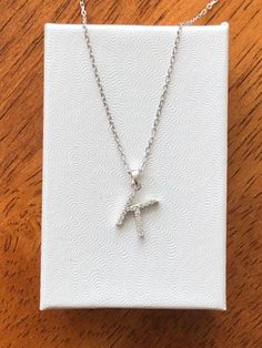 925 Sterling Silver Cz Initial Letter K Pendant Necklace - Metal: 925 Sterling Silver (Finish: Rhodium Plated) - Stone: Clear Cubic Zirconia, Round, Pave - Shape: Initial Letter K - Pendant Dimension: 9mm(0.35 in) x 6mm(0.24 in) x 1mm, Thickness 1mm.  - Light Cable Chain: 18" Adjustable (16" + 1" + 1"), Spring Ring Clasp - Color: Silver Letter K Necklace, K Pendant, Initial K, K Necklace, Zirconia Necklace, Cubic Zirconia Necklace, Letter K, Letter Pendants, Initial Letter