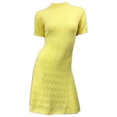 Tres chic ST. JOHN signature santana knit canary yellow short sleeve A-Line dress! Features the softest knit that stretches to fit. Hand crochet detail at the neck, sleeves and below the waist. Full metal zipper up the back with hook-and-eye closure. Great belted or alone. The perfect yellow color that matches any skin tone. Very well made, with heavy attention to detail. In great condition. Made in USA Approximately Size Medium / Large (tons of stretch) Measurements: 36-42 inch bust 32-40 inch Dresses One Piece, Gemini Moon, Floral Print Gowns, Clothes Stickers, Daisy Jones And The Six, 60s 70s Fashion, April Fool, Fashion Hippie, Fashion Png