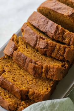 sliced loaf of pumpkin bread on a tray