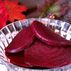 sliced beets in a glass bowl on a table