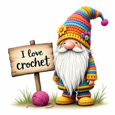 a gnome holding a sign that says i love crochet with a ball of yarn next to it