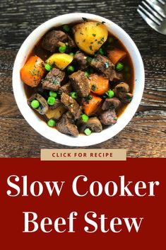 slow cooker beef stew with potatoes and peas in a white bowl on a wooden table