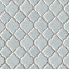 an abstract white tile pattern with wavy lines