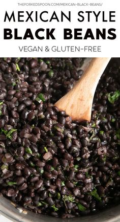 mexican style black beans in a pot with a wooden spoon and text overlay that reads vegan & gluen - free