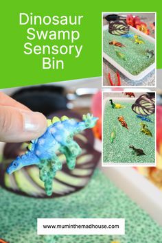 a hand holding a small toy lizard on top of a green surface with pictures of different animals