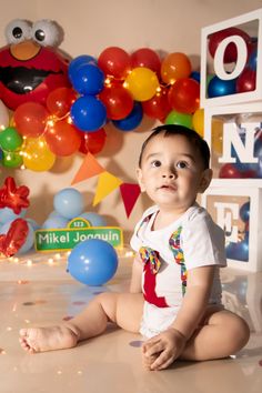 Baby boy first birthday colorful photoshoot, cake, balloons Elmo First Birthday Photoshoot, Elmo Photoshoot, Seaseme Street Birthday Party, Elmo Smash Cake, Seaseme Street