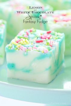 lemon white chocolate spring fantasy fudge on a plate with sprinkles and candy