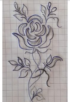 a drawing of a rose on a sheet of paper