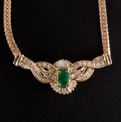 14k Yellow Gold Emerald Diamond Cluster Cocktail Italian Necklace 1.98ctw 10.88gMetal Information: 14k Yellow GoldTotal Weight: 10.88gChain Width: 3.1mmChain Length: 17.5"Pendant Dimensions: 16mm x 42.5mmAdditional Information: Made In ItalyStone InformationMain StoneGem Type: EmeraldShape: Emerald (7 x 5mm)Color: GreenClarity/Quality: BCarat Weight: 1.0ctNumber of Stones: 1Accent StoneGem Type: DiamondShape: Round (1.7mm)Color: HClarity/Quality: SI2Carat Weight: .02ctNumber of Stones: 28Accent Luxury Yellow Gold Plated Emerald Necklace, Italian Gold Necklace, Luxury Yellow Gold Pear-shaped Emerald Necklace, Luxury Yellow Gold Hand-set Emerald Necklace, Luxury Hand-set Yellow Gold Emerald Necklace, Luxury Faceted Yellow Gold Emerald Necklace, Gold Necklace Vintage, Italian Necklace, Italian Gold Jewelry