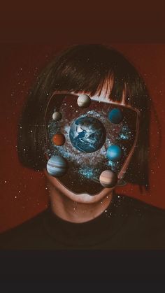 an instagram photo with the image of a woman's face surrounded by planets