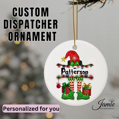 a personalized christmas ornament hanging from a tree with the word, custom dispatcher ornament