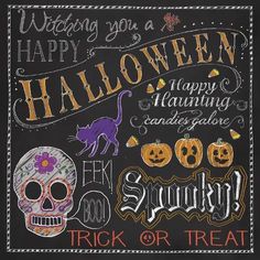 a chalkboard sign with halloween decorations and lettering on the front, says happy halloween