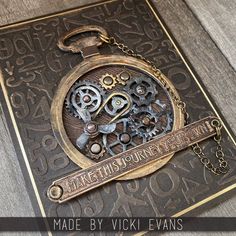 a close up of a clock on a card