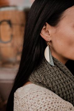 We LOVE this brand new collection of edgy earrings!!! This pair of big stud earrings begins with a simple, modernist, half moon slice of leather that has been individually hand-pressed  from our ever changing stock of leather hides. They are then paired with a bright, brushed brass half moon charm that has been sealed to prevent tarnish. Shown in an autumn color palette but available in a wide rang of colors. At about 3 inches they are a fairly long stud earring.  Also available on hooks that wo Pastel Leather, Autumn Color Palette, Big Stud Earrings, Pastel Earrings, Edgy Earrings, Leather Hides, Moon Studs, Fall Color Palette, Fan Earrings