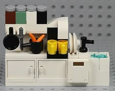 a lego kitchen with various items on the counter