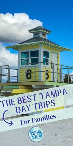 the best tampa day trips for families are on top of this lifeguard tower at the beach